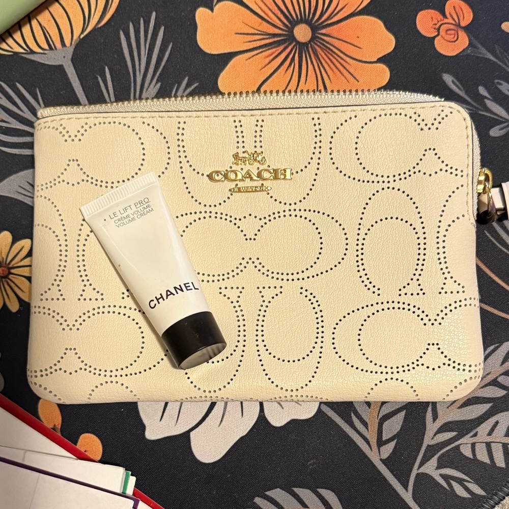 Coach Ivory Perforated Wristlet